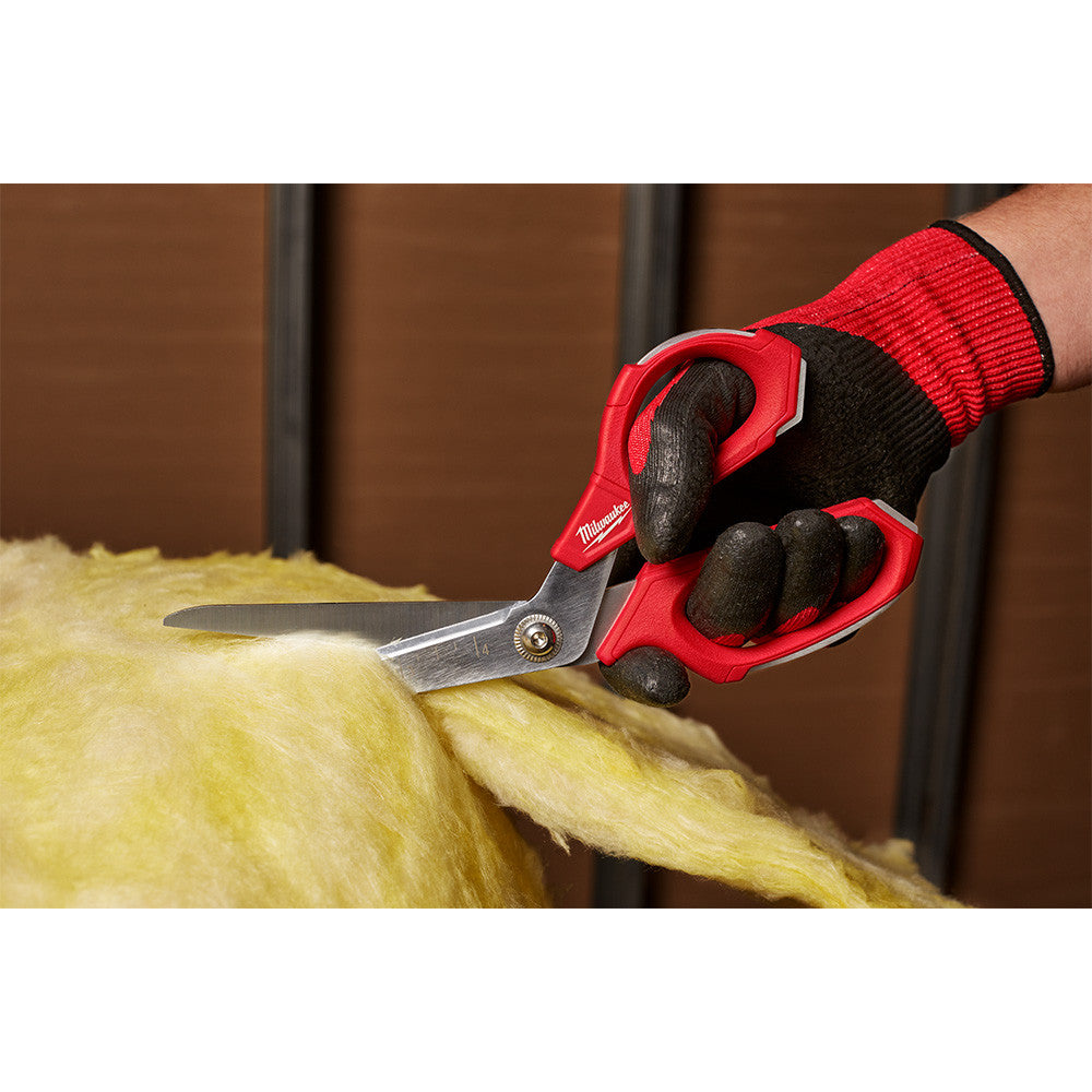 Milwaukee 48-22-4047 Jobsite Offset Scissors showing scissors in cutting fiberglass insulation