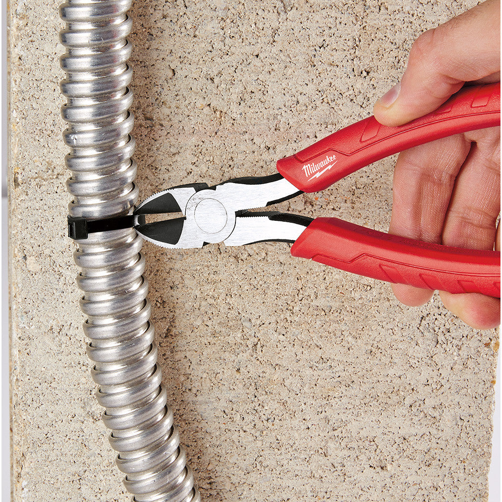 Milwaukee 48-22-6106 6 inch Comfort Grip Diagonal Pliers showing in use cutting zip-tie off of BX cable