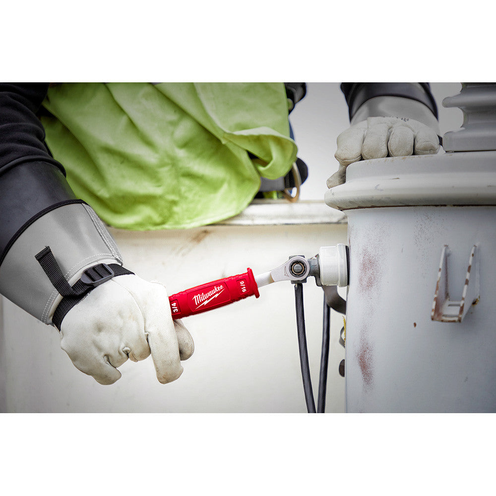 Milwaukee 48-22-9211 Lineman's 2-In-1 Insulated Ratcheting Box Wrench showing in use fastening bolt through terminal crimp to connect wires to transformer