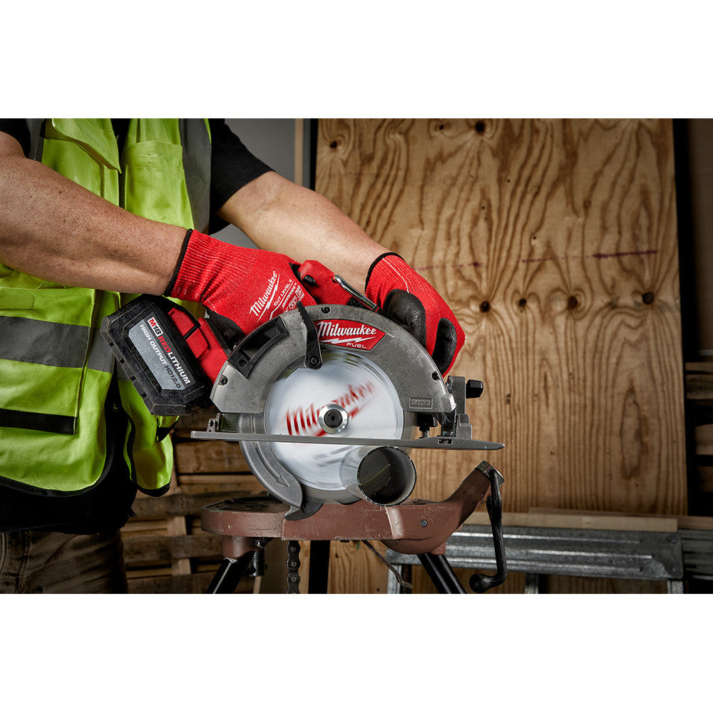 Milwaukee 48-40-4220 6-1/2-inch x 48T Metal Cutting Circular Saw Blade showing in use cutting round tubing with circular saw (circular saw sold separately)