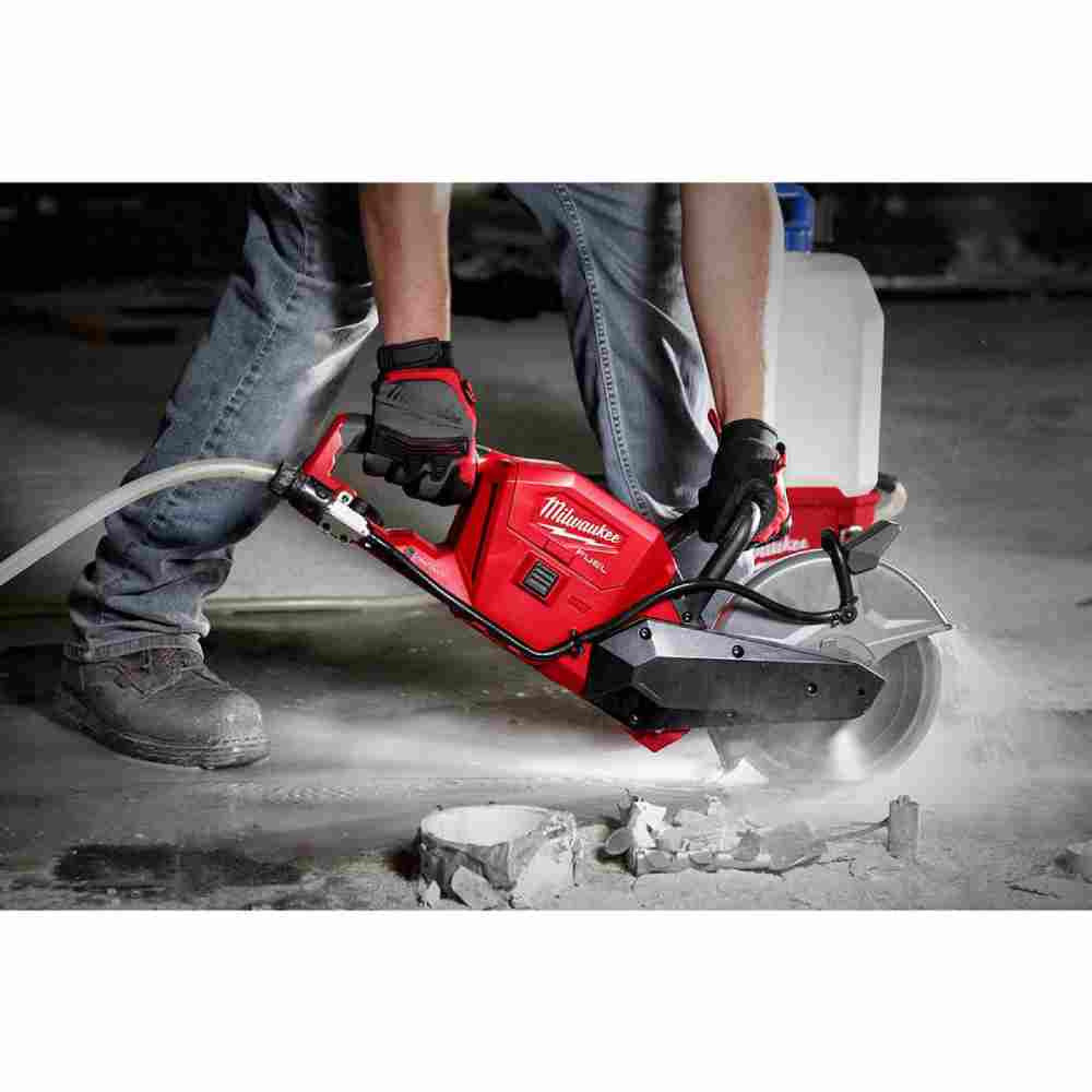 Milwaukee 49-93-7125 9 inch Diamond Universal Segmented Turbo Blade showing in use mounted to cutoff saw cutting through concrete slab