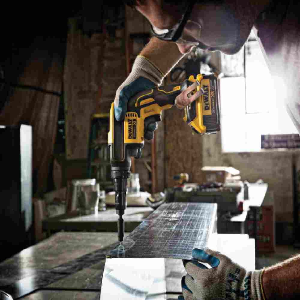 DeWalt DCF622B 20V MAX XR Cordless Versa-Clutch Adjustable Torque Screw Gun (Tool Only) showing driving screws through sheet metal into steel studs