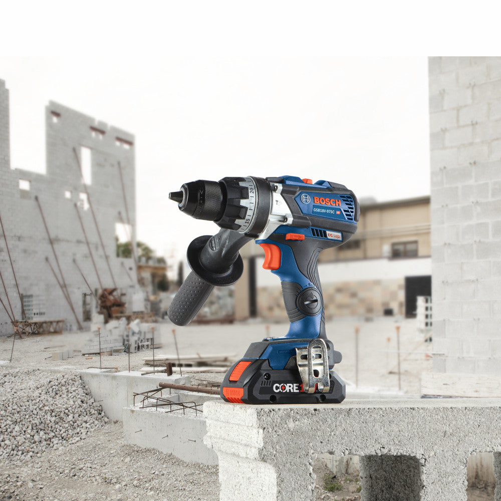 Bosch GSB18V-975CN 18V Cordless Brushless 1/2 inch Hammer Drill/Driver (Tool Only) showing resting on a concrete block between usage