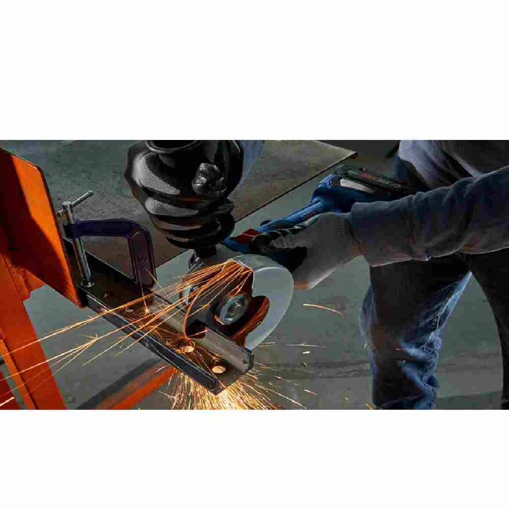 Bosch GWS18V-8N 18V 4 1/2 inch Angle Grinder with Slide Switch metal cutting on clamped on a table