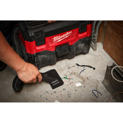 Milwaukee 0880-20 M18 Wet/Dry Vacuum cleaning up worksite debris ( battery not included)