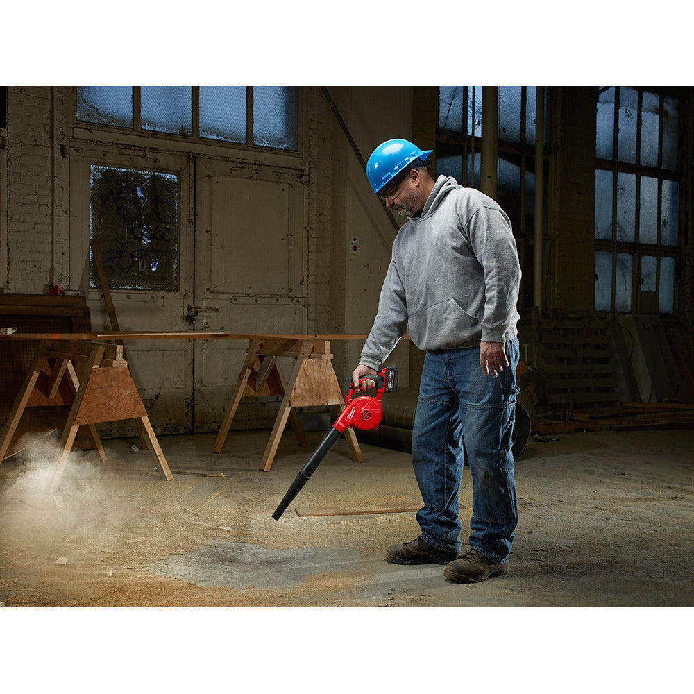 Milwaukee 0884-20 M18 Compact Blower (Tool Only) cleaning up a work area (battery not included)