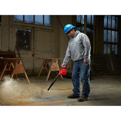 Milwaukee 0884-20 M18 Compact Blower (Tool Only) cleaning up a work area (battery not included)