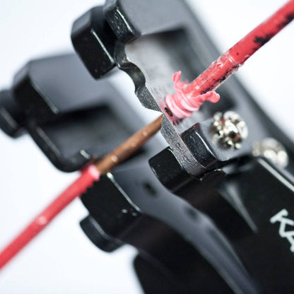 Klein Tools 11063W 8-22 AWG Solid & Stranded Katapult Wire Stripper & Cutter showing in use stripping electrical cable