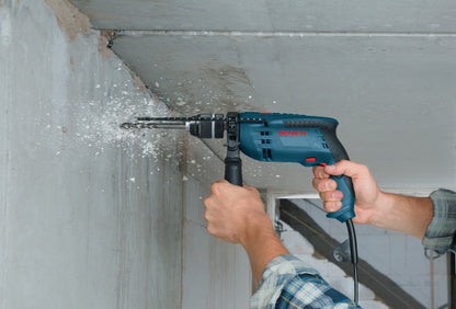 Bosch 1191VSRK 7 Amp 1/2 inch Variable Speed Hammer Drill showing in use drilling horizontally into a concrete