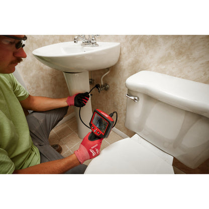 Milwaukee 2323-21 M12 M-Spector 360 4-foot Inspection Camera Kit showing use looking down and pipe in a wall