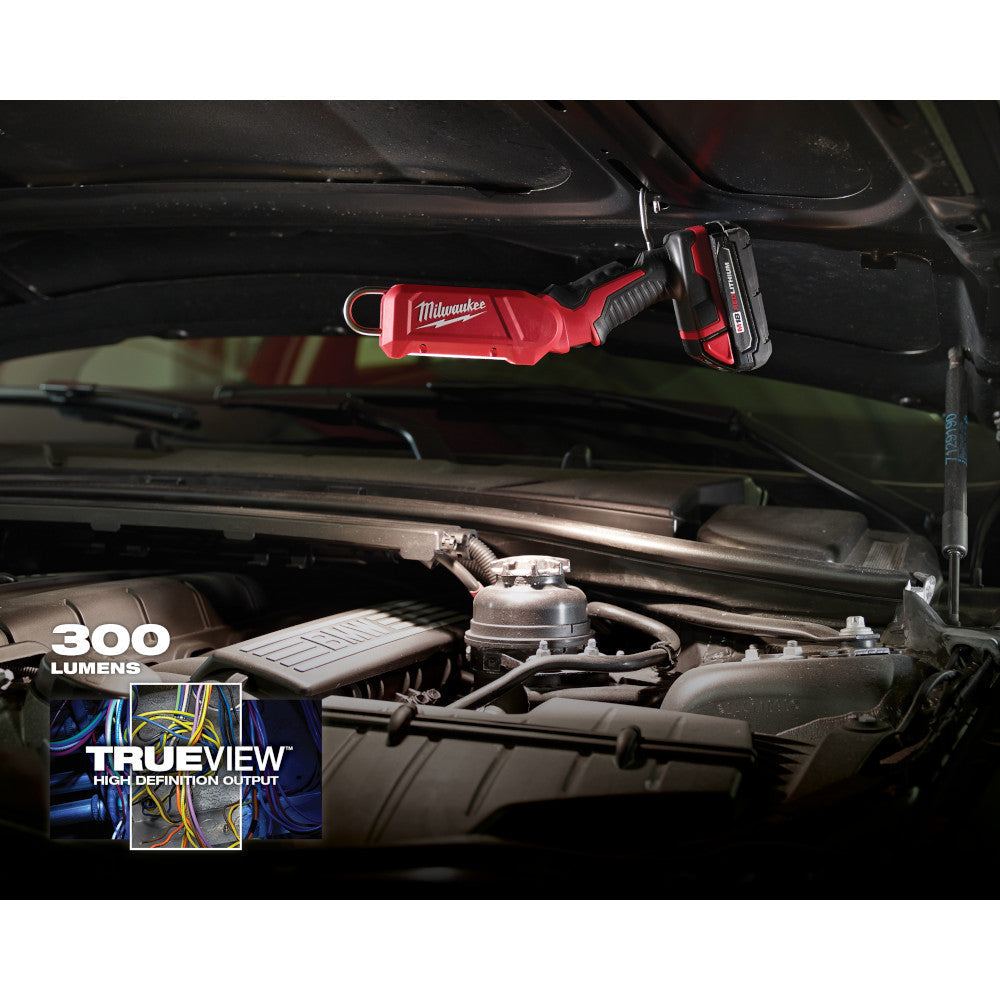 Milwaukee 2352-20 M18 LED Stick Light illuminating work area while hanging (battery sold separately)