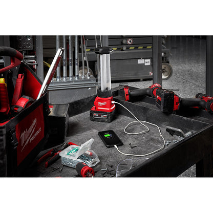 Milwaukee 2363-20 M18 Work Lantern / Trouble Light with USB Charging illuminating a work area (battery sold separately)