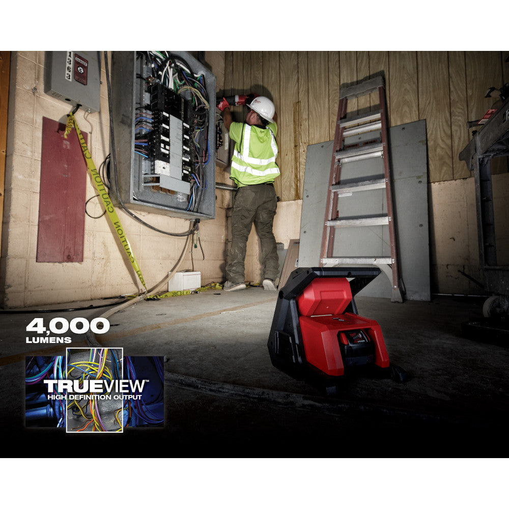 Milwaukee 2366-20 M18 ROVER 4000 Lumen Dual-Power Flood Light illuminating a work area (extension cord not included)