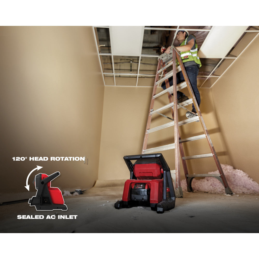 Milwaukee 2366-20 M18 ROVER 4000 Lumen Dual-Power Flood Light illuminating a work area (extension cord not included)