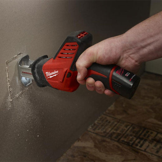 Milwaukee 2420-20 M12 HACKZALL Reciprocating Saw cutting drywall (battery and blade sold separately)