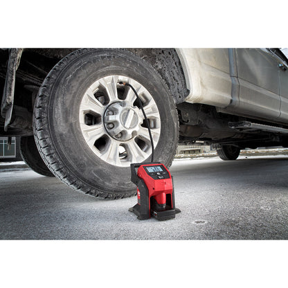 Milwaukee 2475-20 M12 Compact Air Inflator inflating an LT truck tire (battery sold separately)