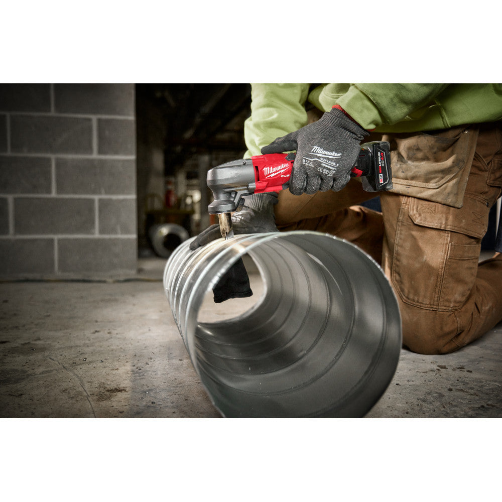 Milwaukee 2476-20 M12 FUEL Cordless 16 Gauge Variable Speed Nibbler (Tool Only) showing in use cutting round spiral ducting