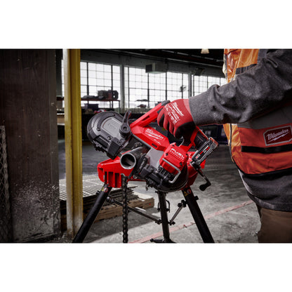 Milwaukee 2529-20 M12 FUEL Cordless Brushless Compact Band Saw (Tool Only) showing in use cutting a pipe while mounted on a tripod
