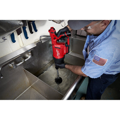 Milwaukee 2572B-21 M12 AIRSNAKE Cordless Drain Cleaning Air Gun Kit showing in use clearing a sink clog