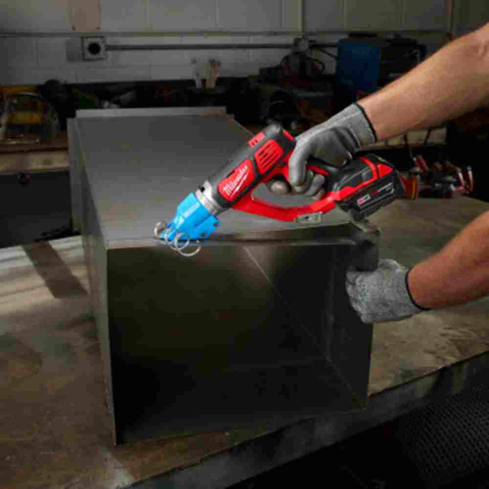Milwaukee 2636-20 M18 Cordless 14 Gauge Double Cut Shears (Tool Only) showing in use cut squared off sheet metal