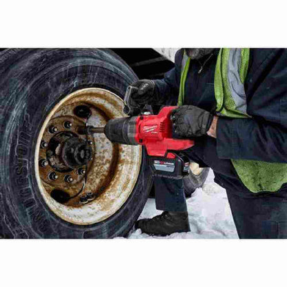 Milwaukee 2869-22HD M18 FUEL Cordless Brushless D-Handle Extended Anvil High Torque 1 inch Impact Wrench Kit showing in use fastening a lug nut on heavy equipment