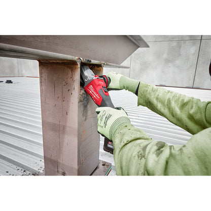 Milwaukee 2887-20 M18 FUEL Cordless Brushless 5 inch Flathead Braking Grinder with Slide Switch No-Lock (Tool Only) showing in use grinding metal I-beam after welding together