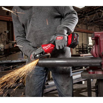 Milwaukee 3672-20 M18 FUEL Cordless Brushless 4-1/2 inch / 6 inch VS Braking Angle Grinder with Paddle Switch and ONE-Key (Tool Only) showing in use grinding down edge of steel pipe (Battery sold separately)