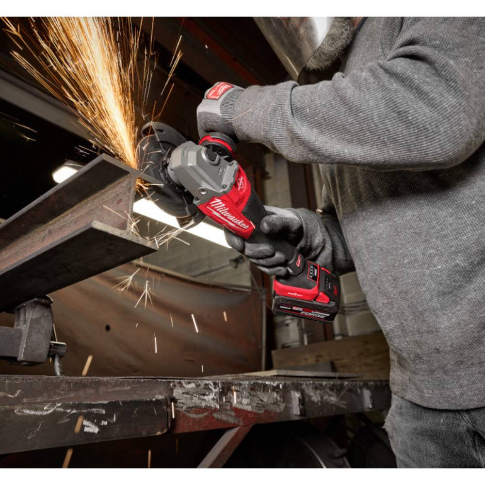 Milwaukee 3672-20 M18 FUEL Cordless Brushless 4-1/2 inch / 6 inch VS Braking Angle Grinder with Paddle Switch and ONE-Key (Tool Only) showing in use cutting down a steel I-beam (Battery sold separately)