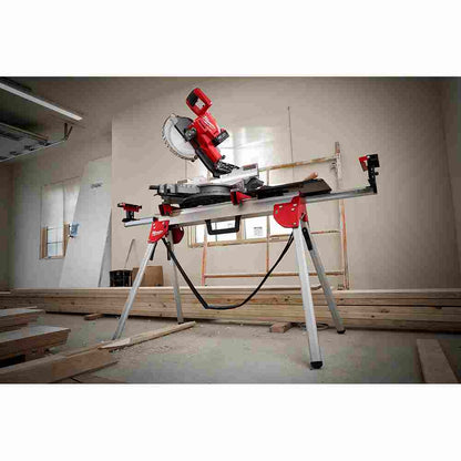 Milwaukee 48-08-0551 Folding Mitre Saw Stand showing on a jobsite with saw mounted to stand (Saw sold separately)
