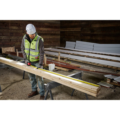 Milwaukee 48-22-1216 16ft Wide Blade Tape Measure showing in action measuring and marking studs