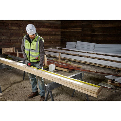 Milwaukee 48-22-1225 25' Wide Blade Tape Measure showing in use measuring out wood stud