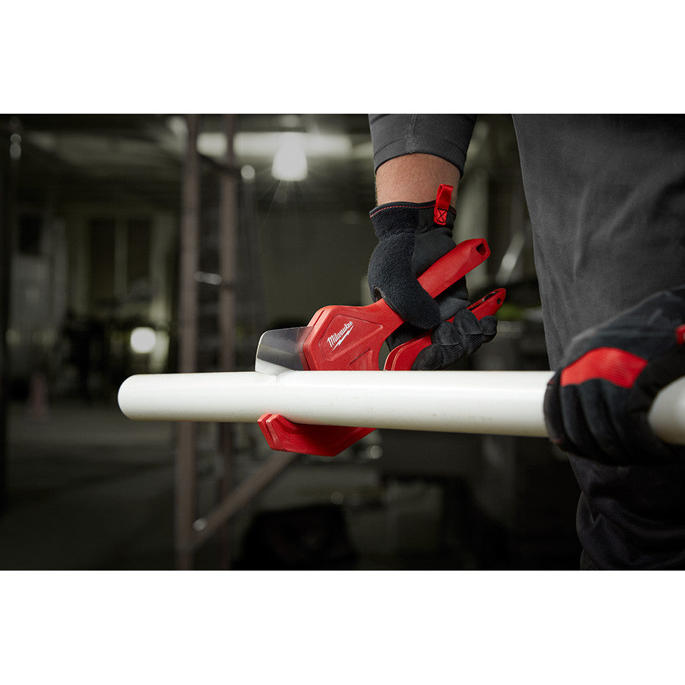 Milwaukee 48-22-4210 1-5/8 inch Ratcheting Pipe Cutter showing in use cutting pipe while being held