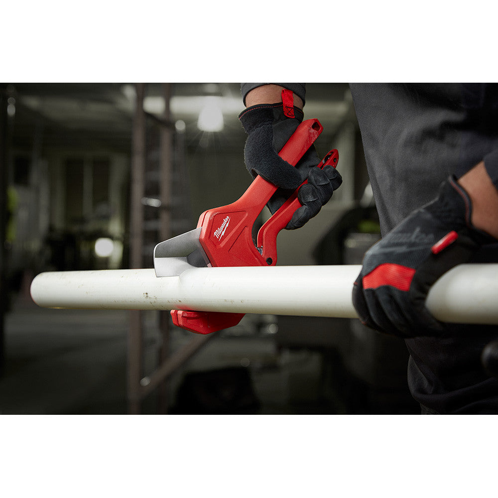Milwaukee 48-22-4215 2-3/8 inch Ratcheting Pipe Cutter showing in use cutting pipe while being held