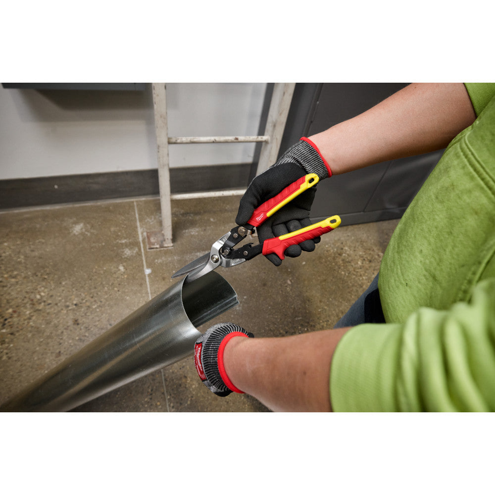 Milwaukee 48-22-4567 18GA Stght/Long Offset Snips showing in use cutting through metal ducting