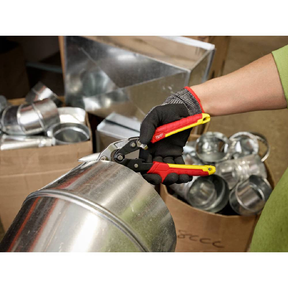 Milwaukee 48-22-4569 18GA Bulldog Aviation Snips showing in use cutting through metal ducting