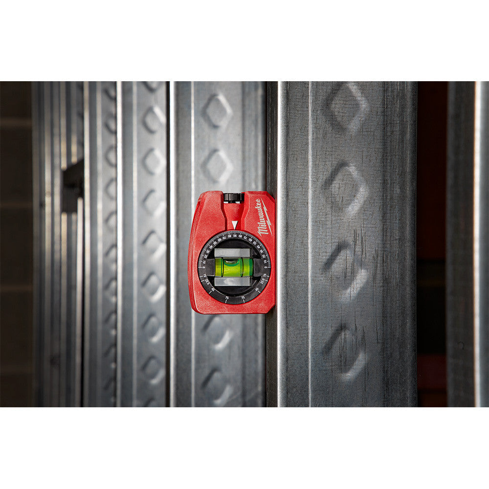 Milwaukee 48-22-5102 4 inch 360 degree Pocket Level showing in use to plumb a steel stud wall