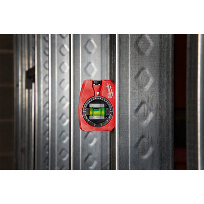 Milwaukee 48-22-5102 4 inch 360 degree Pocket Level showing in use to plumb a steel stud wall