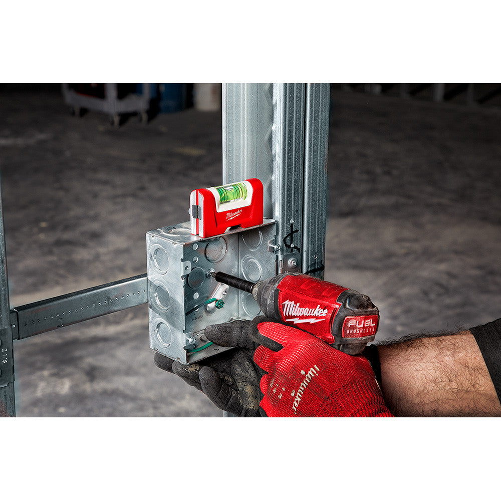 48-22-5603 3 inch Compact Magnetic Pocket Level showing level in use leveling an electrical box