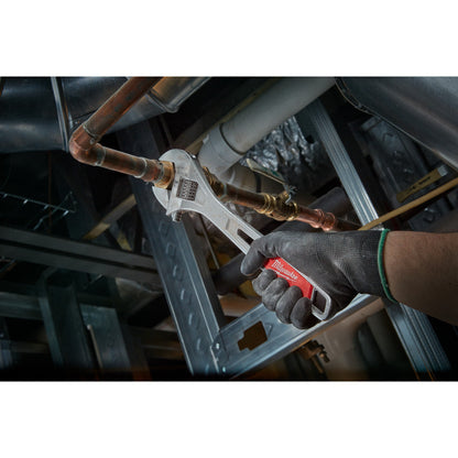 Milwaukee 48-22-7412 12 inch Adjustable Wrench showing in use fastening metal pipe together
