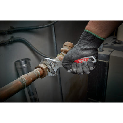 Milwaukee 48-22-7508 8 inch Wide Jaw Adjustable Wrench showing in use fastening metal pipe together