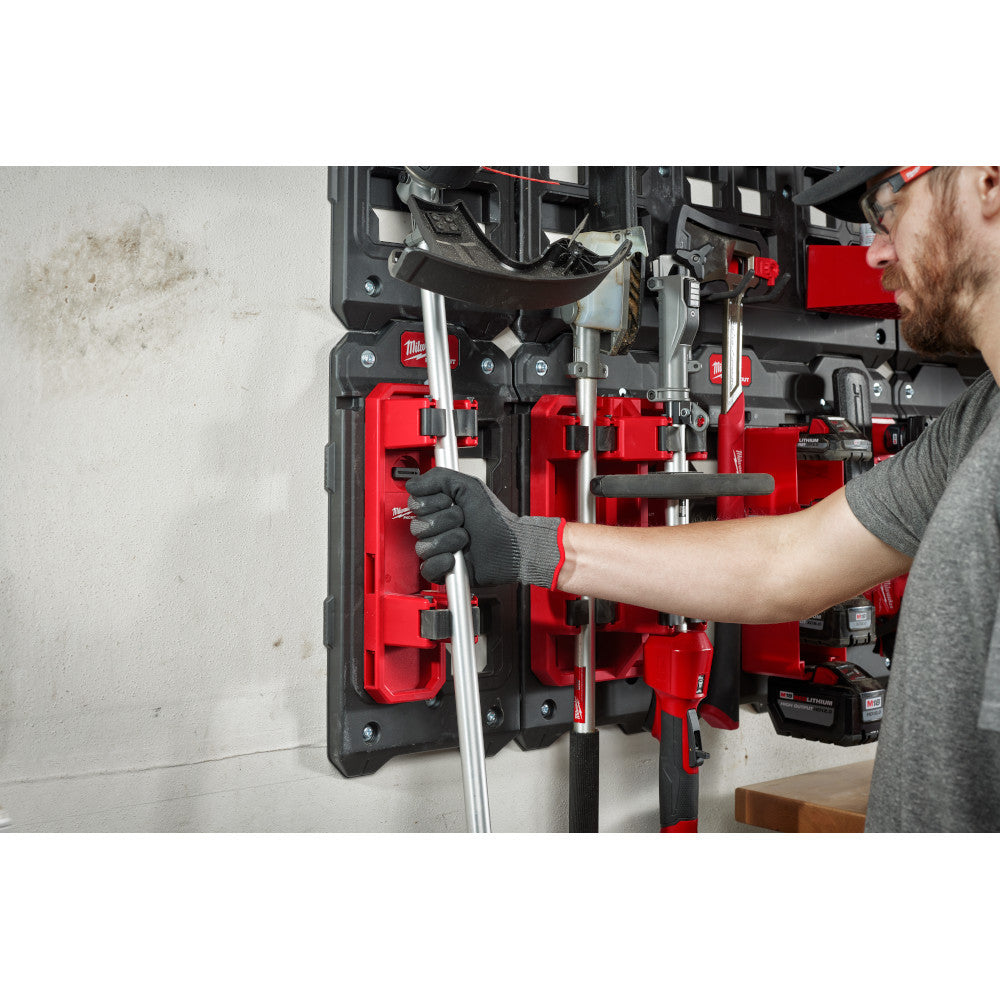 Milwaukee 48-22-8348 PACKOUT Long Handle Tool Holder showing long handle tool holder attached to packout wall panel with tool attached