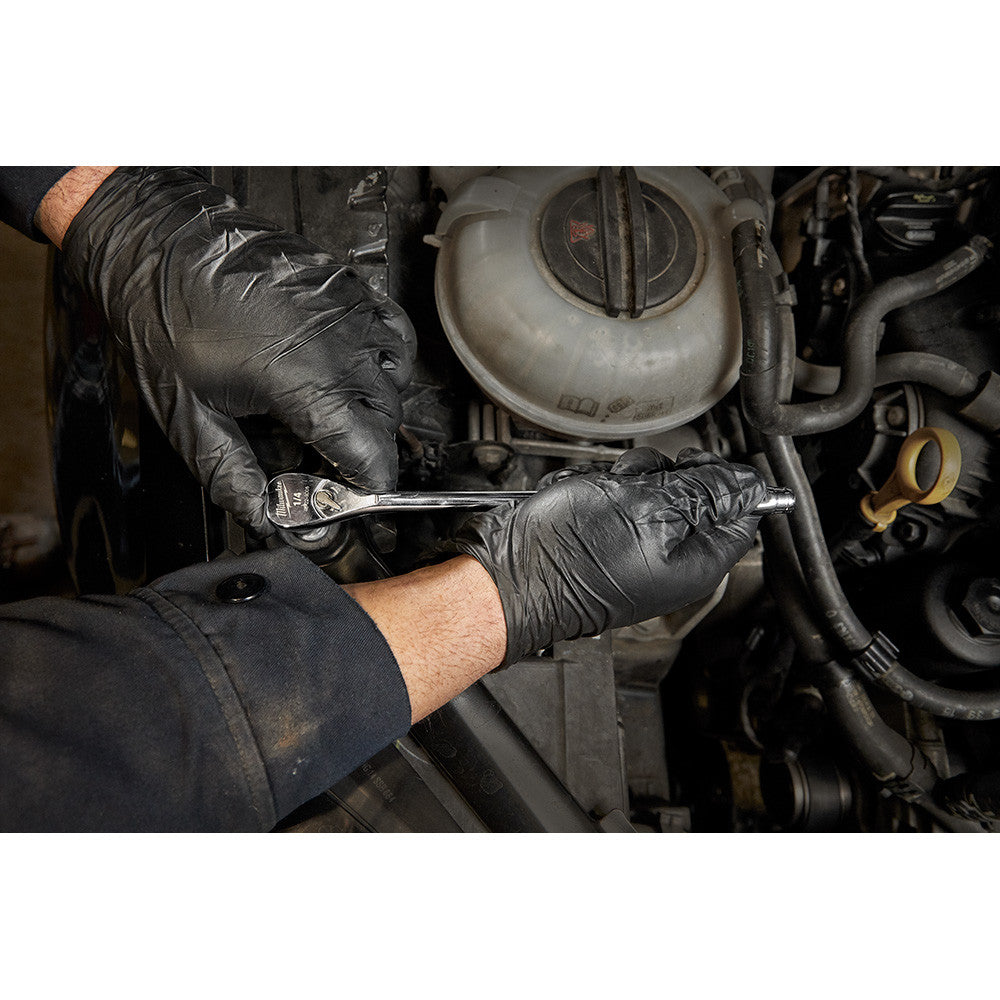 Milwaukee 48-22-9005 1/4-inch Drive 9-inch Extended Ratchet showing in use fastening bolt inside motor cavity