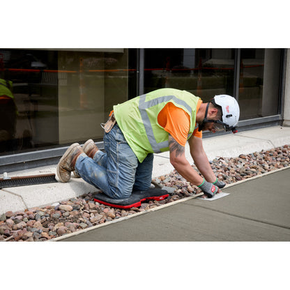 Milwaukee 48-73-6110 PACKOUT Kneeling Pad contractor kneeling on pad