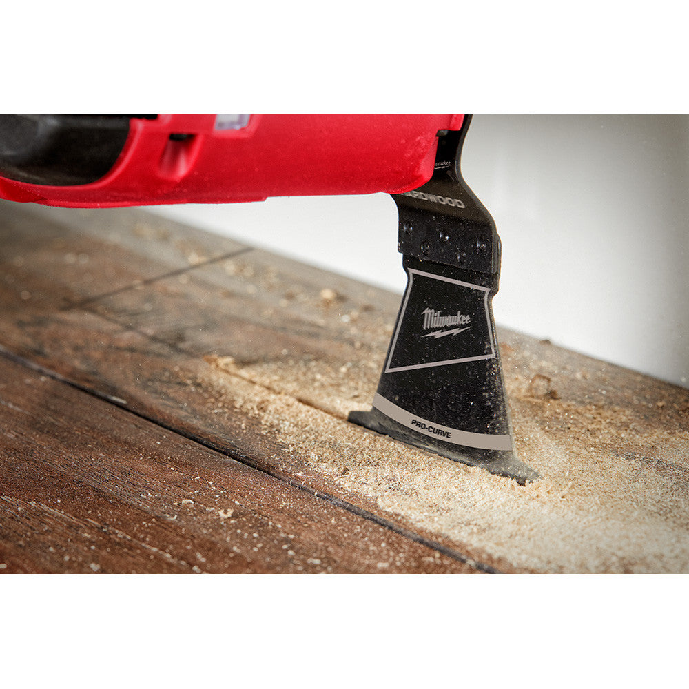 Milwaukee 49-25-1153 OPEN-LOK 2-1/2-inch Universal Fit HCS Japanese Teeth Hardwood Cutting Multi-Tool Oscillating Blades - 3pk showing in use plunge cutting into laminate flooring
