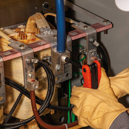 Klein Tools 70550 11-Key SAE Pro Folding Hex Key Set showing in use fastening  industrial cable to bracket