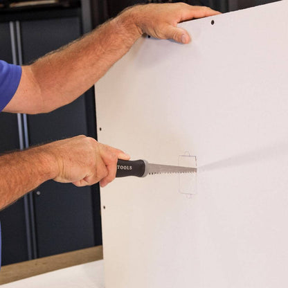 Klein Tools 725 Jab Saw showing in use cutting through drywall for junction box