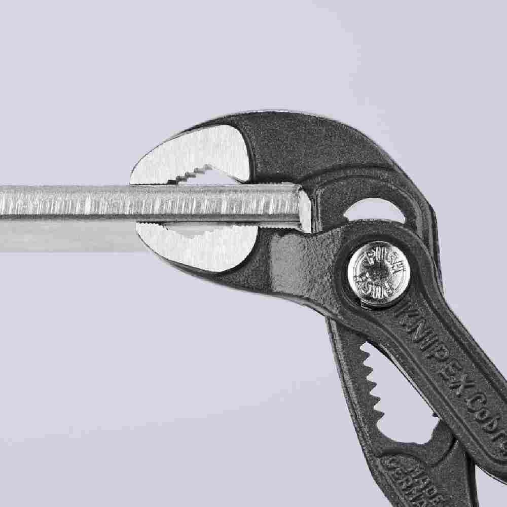 Knipex 8702250SBA 10 inch Cobra Water Pump Comfort Plier showing holding flat stock