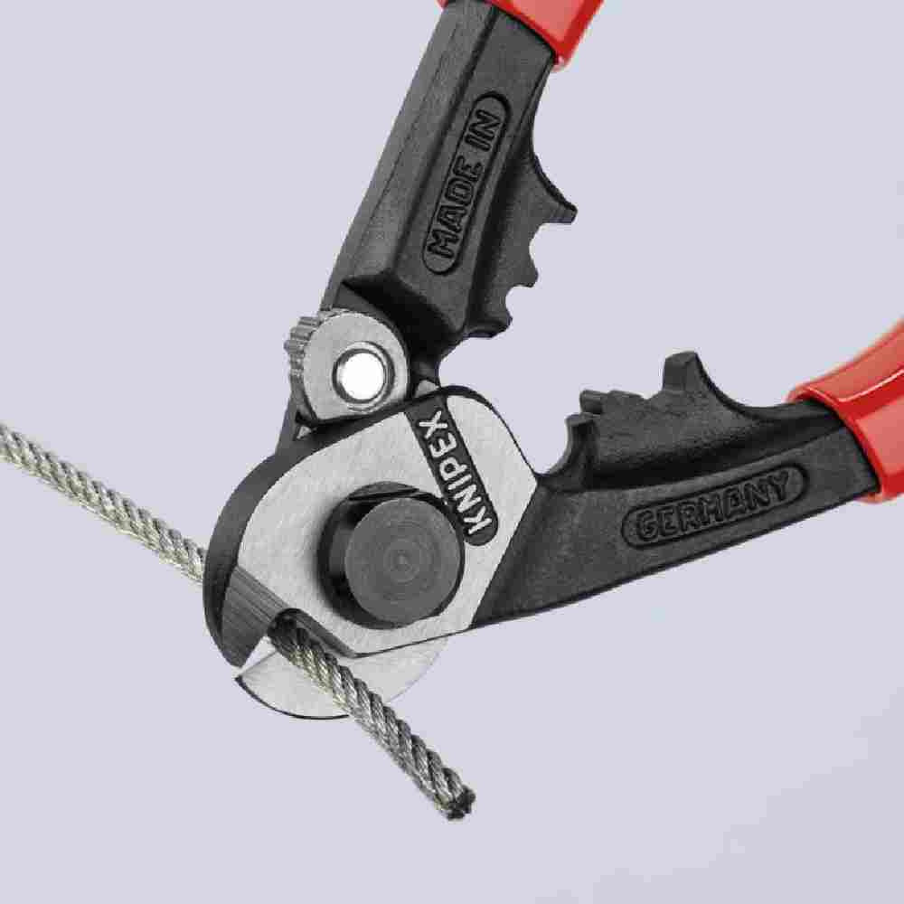 Knipex 9561190SBA 7-1/2 inch Wire Rope Shears show while cutting wire rope/ cable