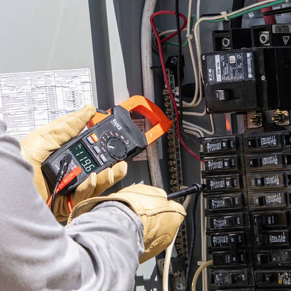 Klein Tools CL710 600 Amp AC/DC Auto-Ranging Digital Pro Clamp Meter showing in use  measuring electrical elements with leads