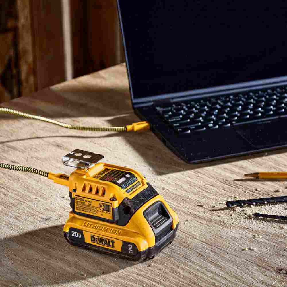 DeWalt DCB094K 20V MAX Charger and USBC Adaptor Kit showing in use charging personal laptop